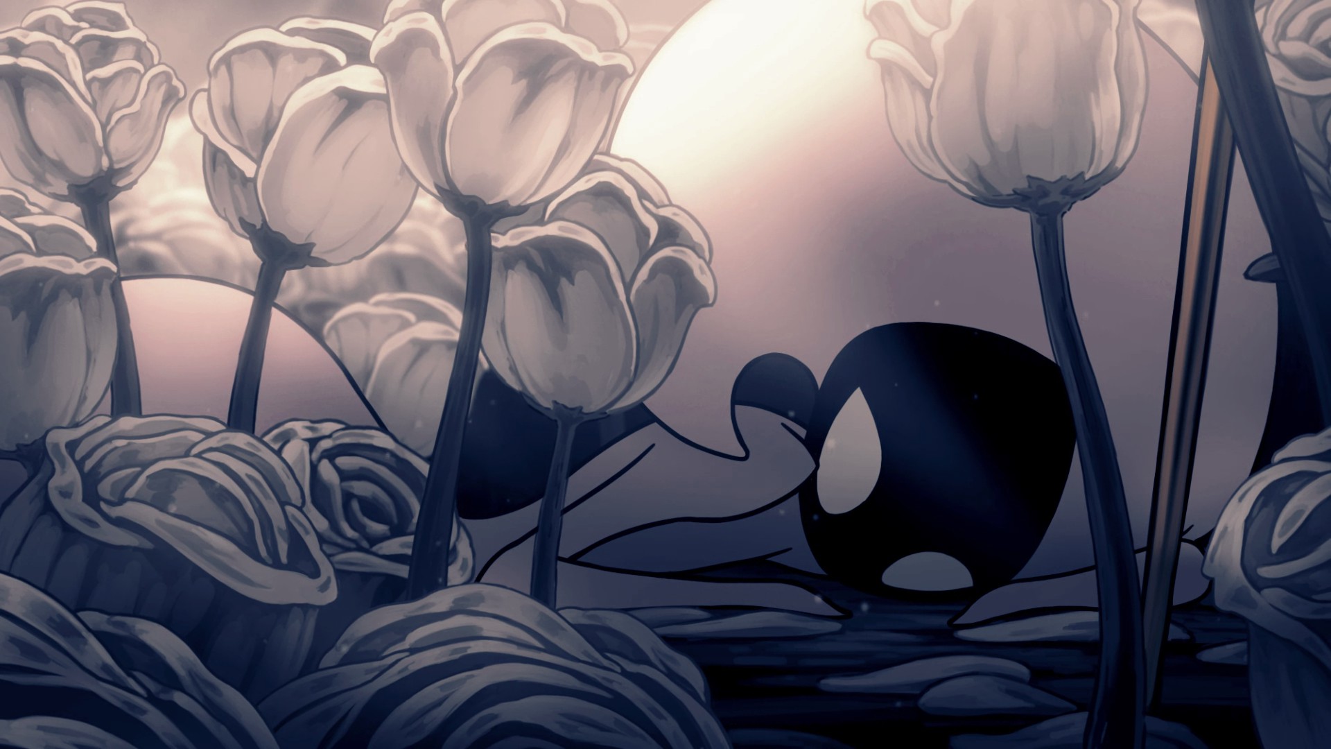 Lace, una bicha, muy puta por cierto, de color blanco con cara negra y cabezón de QRUASSSON dormida entre plantas blancas