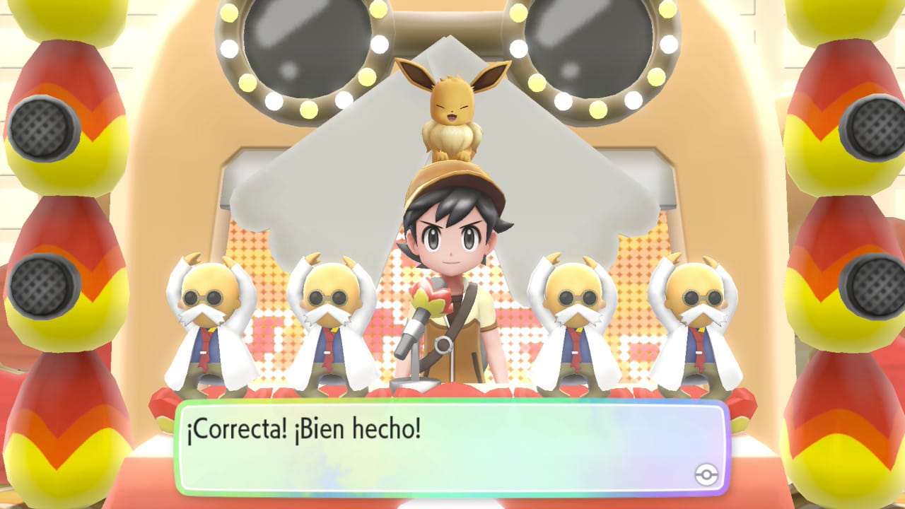 El eevee con el prota en un concurso de televisión con 5 moñecos de Blaine, el gimnasio ahora es un plató de televisión