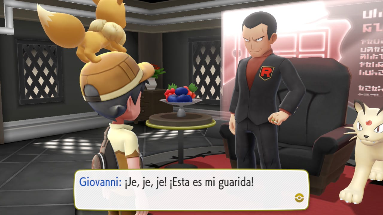 Giovanni en su puesto de líder del octavo gimnasio, diciendo que esta es su guarida al protacon su eevee en la cabeza, hay un persian y motivos del team rocket